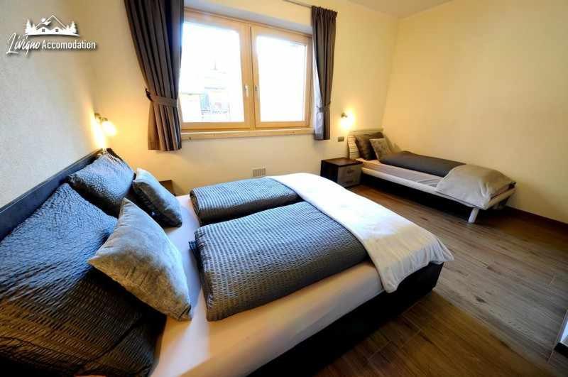 Chalet Riccio By Livigno Accomodation Quarto foto